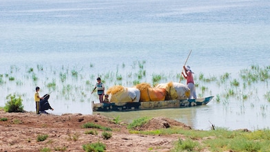 Local people on the Yabani Canal in the South of Iraq