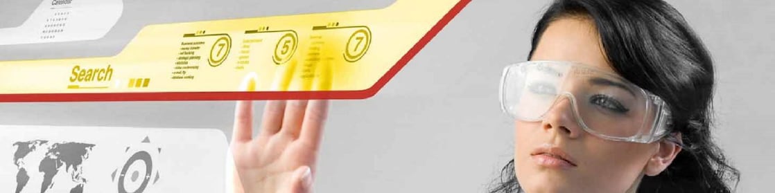 Woman working with a digital touch screen.