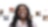 African American female with long black hair, with a mosaic of images surrounding her.