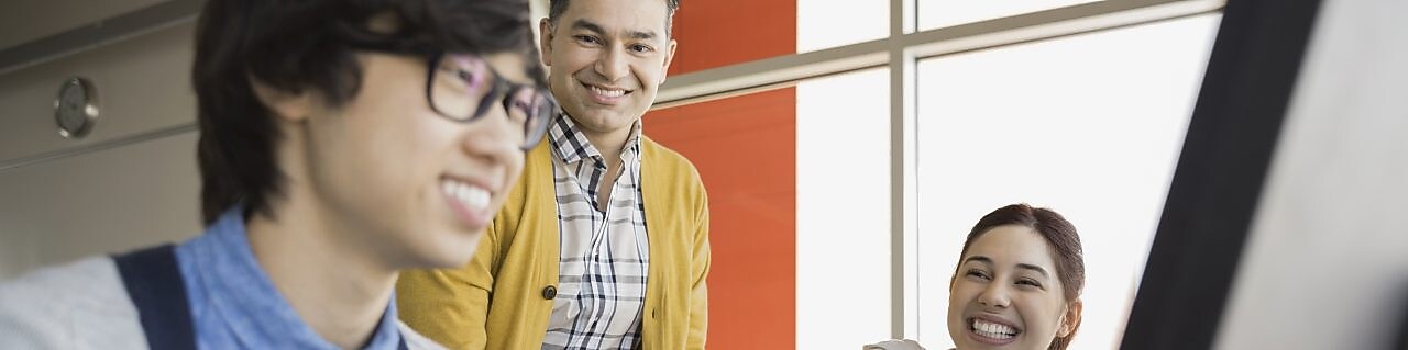 Students and teacher in computer lab