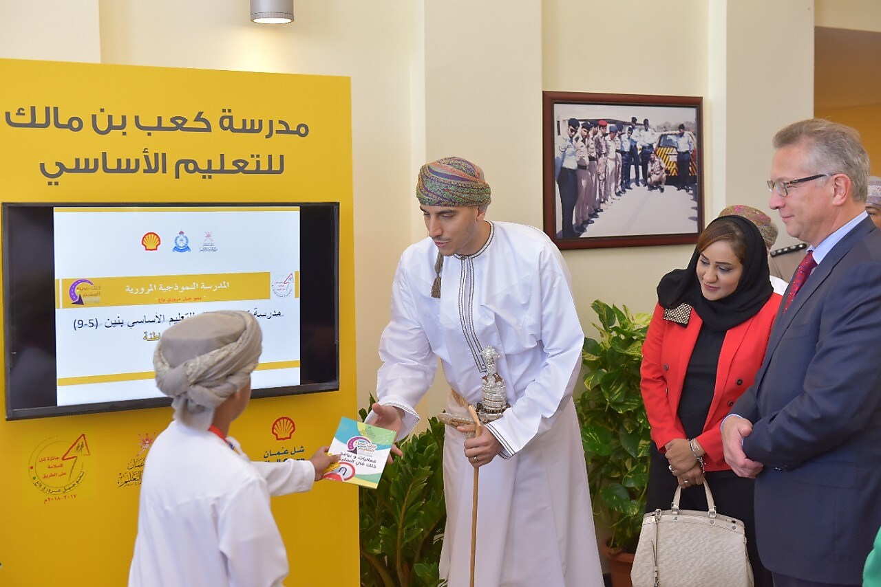 kid receiving certificate