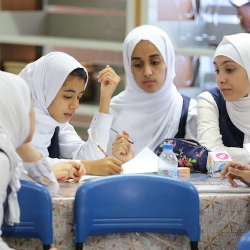 Girls sitting in group
