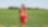An employee stands in a field near a Quest C02 injection well northeast of Edmonton, Alberta in Canada